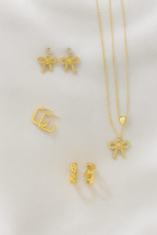 Elegant Gold-Tone Jewelry Set with Bow & Geometric Accents – 5 Pieces