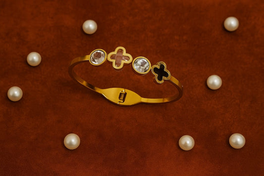 Gold Designer Bangle with Stones & Clover Charms – Trendy Women’s Bracelet