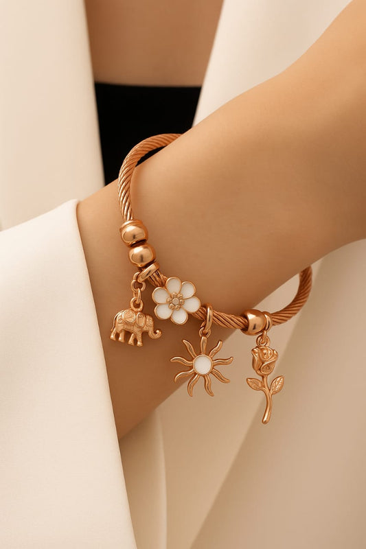 Elegant Rose Gold Charm Bracelet – Elephant, Flower, Sun & Rose Charms